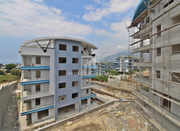 Двухкомнатная квартира, 60м², в комплексе на этапе строительства в 750м от моря, Аланья, Каргыджак ID-10307 фото-9