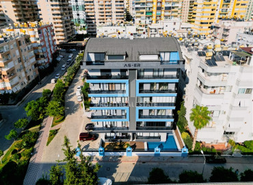Two bedroom apartment, 90m², in a new residence with a swimming pool, with a good location in Mahmutlar ID-10313 фото-1