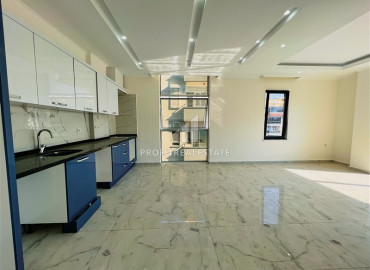 Two bedroom apartment, 90m², in a new residence with a swimming pool, with a good location in Mahmutlar ID-10313 фото-5