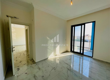 Two bedroom apartment, 90m², in a new residence with a swimming pool, with a good location in Mahmutlar ID-10313 фото-7