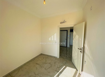 Two bedroom apartment, 90m², in a new residence with a swimming pool, with a good location in Mahmutlar ID-10313 фото-9