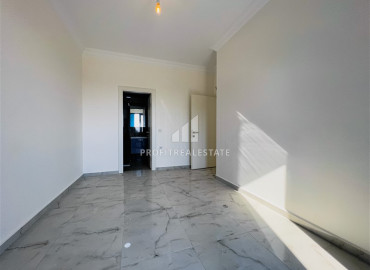 Two bedroom apartment, 90m², in a new residence with a swimming pool, with a good location in Mahmutlar ID-10313 фото-11