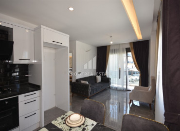 Компактная двухкомнатная квартира, 50м², в новой резиденции в 250м от моря в районе Кестель ID-10318 фото-1