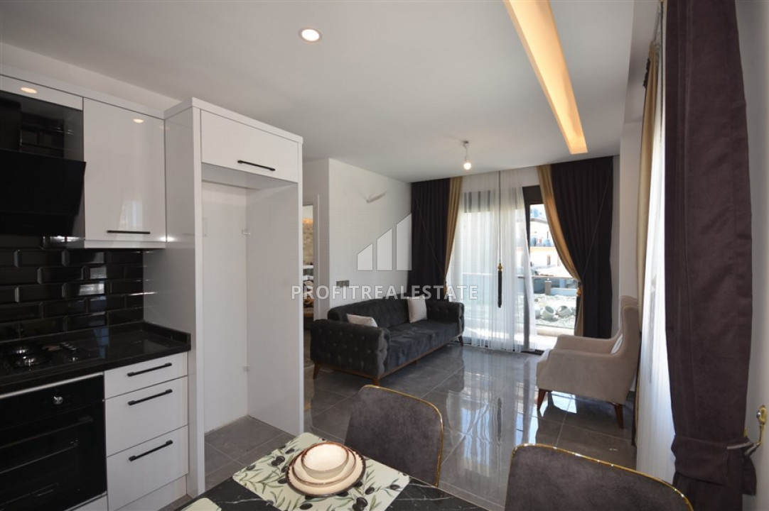 Компактная двухкомнатная квартира, 50м², в новой резиденции в 250м от моря в районе Кестель ID-10318 фото-1
