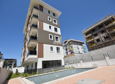 Компактная двухкомнатная квартира, 50м², в новой резиденции в 250м от моря в районе Кестель ID-10318 фото-12