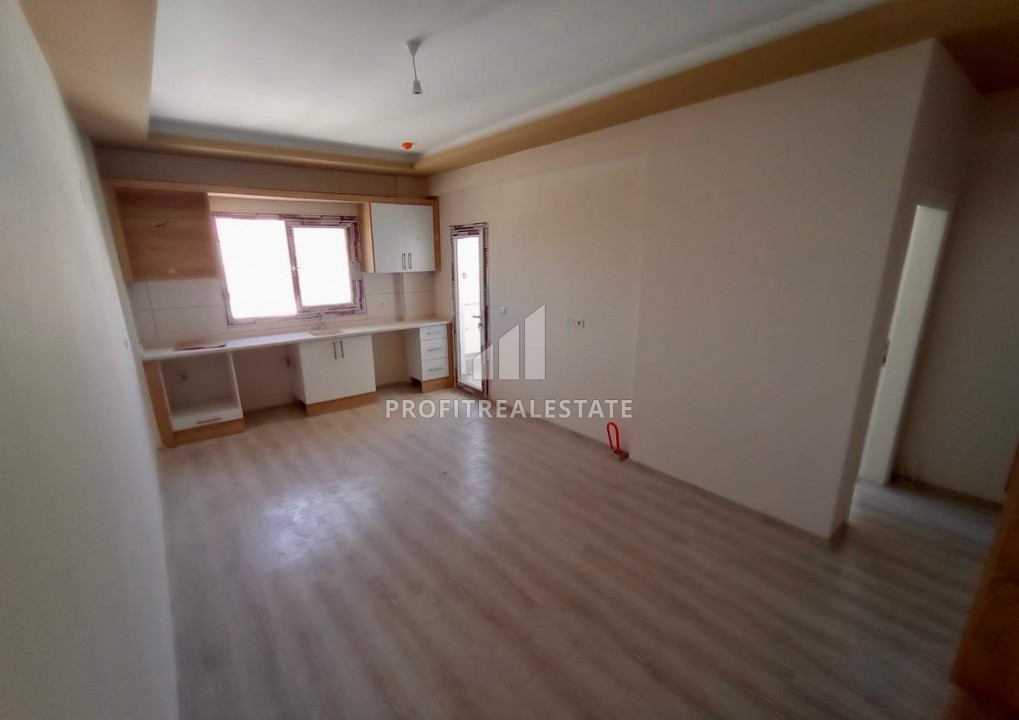 Квартира с одной спальней, 50м², в новом комплексе в районе Томюк, Мерсин ID-10319 фото-2
