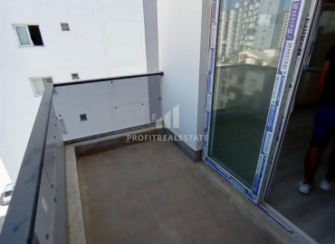 Квартира с одной спальней, 50м², в новом комплексе в районе Томюк, Мерсин ID-10319 фото-10