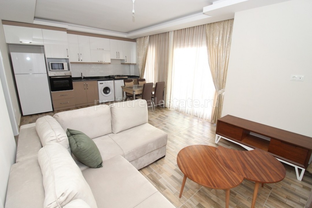Невероятная возможность: меблированная квартира в новом комплексе по супер цене в Махмутларе, Алания, 65 кв.м. ID-0793 фото-1