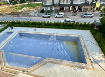 Эргономичная квартира с двумя спальнями, 110м², в комплексе с бассейном в Каргыпынары, Мерсин ID-10322 фото-13