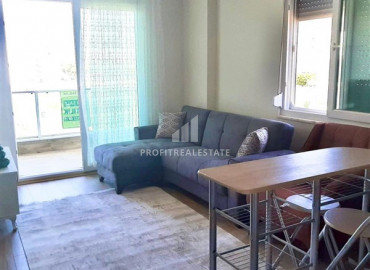 Furnished one-bedroom apartment, 55m², in an urban-type house in Gazipasa, Alanya ID-10327 фото-1