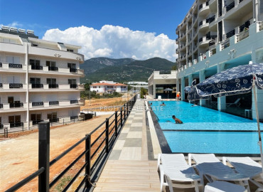 Furnished two-bedroom apartment in a new, well-maintained residential residence, in Upper Oba, Alanya, 100 m2 ID-10347 фото-16