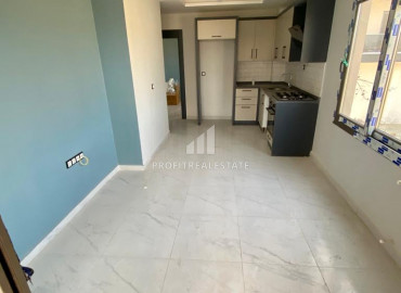 Новая двухкомнатная квартира, 45м², с чистовой отделкой в Мерсине, Тедже, в 500м от моря ID-10384 фото-4