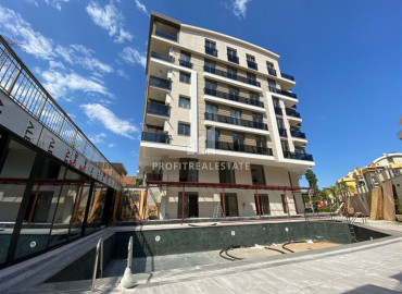 Новая трехкомнатная квартира в резиденции с хорошей инфраструктурой, в Коньяалты, Хурма, Анталья, 85 м2 ID-10424 фото-1