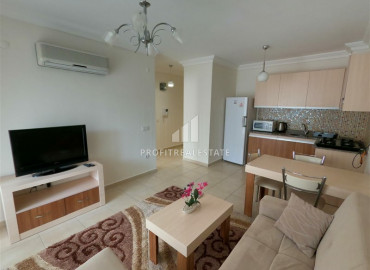 Недвижимость в 200 метрах от моря: меблированная квартира 1+1, 50м² в Махмутларе, Алания ID-10443 фото-1