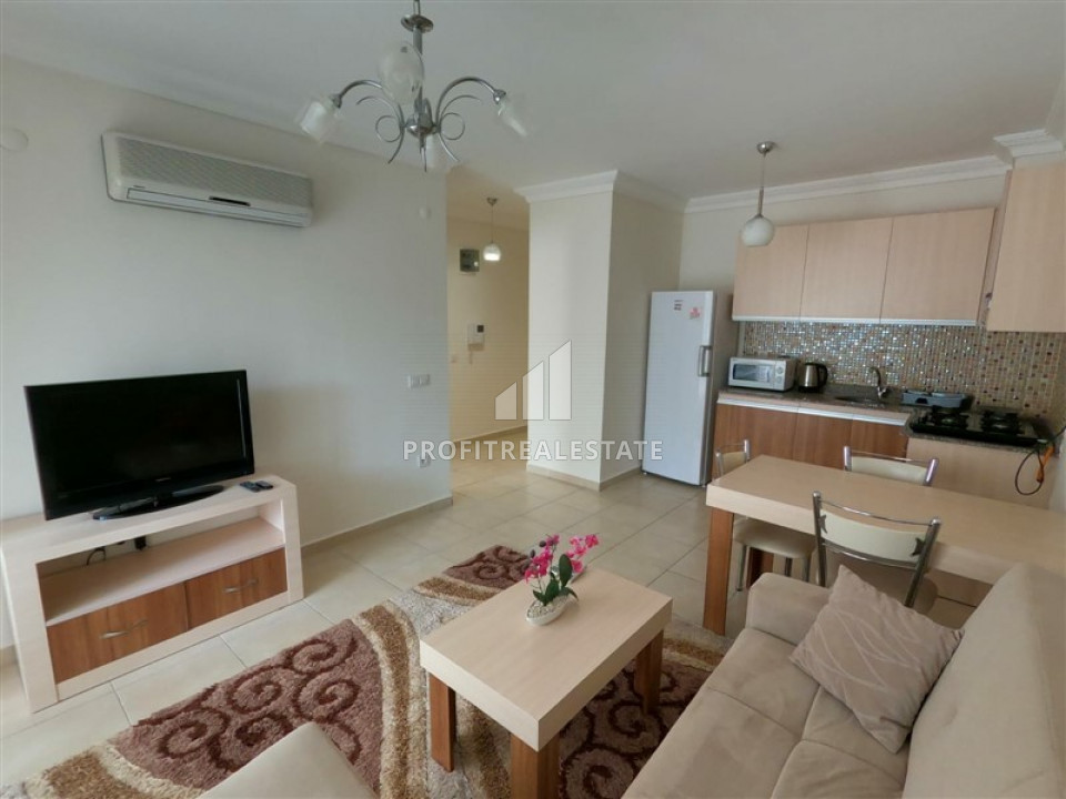 Недвижимость в 200 метрах от моря: меблированная квартира 1+1, 50м² в Махмутларе, Алания ID-10443 фото-1