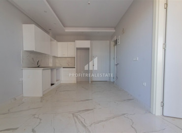 One-bedroom apartment, 55m², in a new residence with good facilities in Mahmutlar, Alanya ID-10461 фото-4