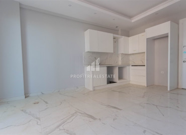 One-bedroom apartment, 55m², in a new residence with good facilities in Mahmutlar, Alanya ID-10461 фото-5