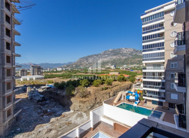 One-bedroom apartment, 55m², in a new residence with good facilities in Mahmutlar, Alanya ID-10461 фото-10