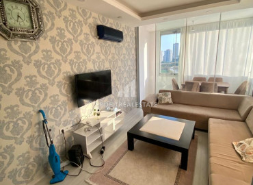 New one-bedroom apartment, 50m², in Çiftlikköy, Yenişehir district, Mersin ID-10489 фото-4