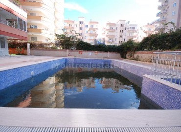 Cozy apartment with furniture in the area of Mahmutlar in Alanya, Turkey ID-0815 фото-2