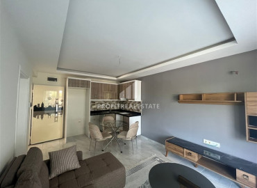 One bedroom apartment, 60m², with new furniture, 700m from the sea in Mahmutlar, Alanya ID-10554 фото-9