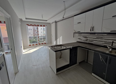 Новая квартира с одной спальней, 72м², в центре Мерсина, в районе Енишехир, 600м от моря ID-10572 фото-5