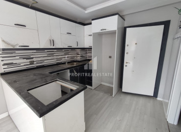 Новая квартира с одной спальней, 72м², в центре Мерсина, в районе Енишехир, 600м от моря ID-10572 фото-7