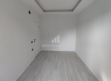 Новая квартира с одной спальней, 72м², в центре Мерсина, в районе Енишехир, 600м от моря ID-10572 фото-11