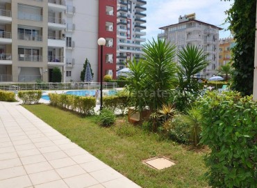 Two-level furnished apartment in a complex with a large territory in the center of Mahmutlar, Alanya, Turkey ID-0817 фото-28