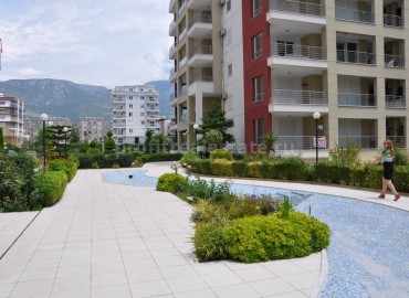 Two-level furnished apartment in a complex with a large territory in the center of Mahmutlar, Alanya, Turkey ID-0817 фото-31