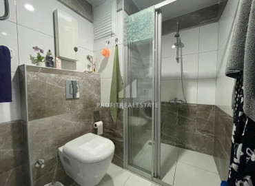 Меблированная двухкомнатная квартира со стильным дизайном в Джикджили, Аланья ID-10598 фото-5