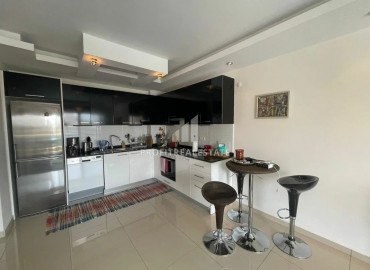 Меблированная двухкомнатная квартира со стильным дизайном в Джикджили, Аланья ID-10598 фото-8