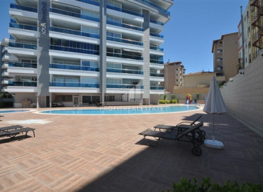 Furnished two bedroom apartment on the seafront in Tosmur, Alanya ID-10600 фото-1