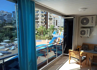 Меблированная двухкомнатная квартира с большим застекленным балконом в Авсалларе, Алания ID-10625 фото-6