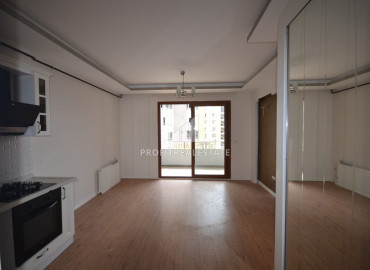 Новая квартира с двумя спальнями, 100м², без мебели, в 500м от моря в районе Мезитли, Мерсин ID-10628 фото-5