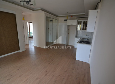 Новая квартира с двумя спальнями, 100м², без мебели, в 500м от моря в районе Мезитли, Мерсин ID-10628 фото-6