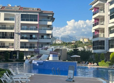 Elegant two bedroom apartment, 105m², in a residence with hotel facilities by the sea in Kestel ID-10629 фото-1