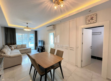 Cozy one-bedroom apartment, furnished and equipped, 150 meters from the center of Mahmutlar, Alanya ID-10636 фото-2