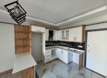 Стильная новая квартира c двумя спальнями, 110м², у моря в районе Мезитли, Мерсин, ID-10656 фото-1