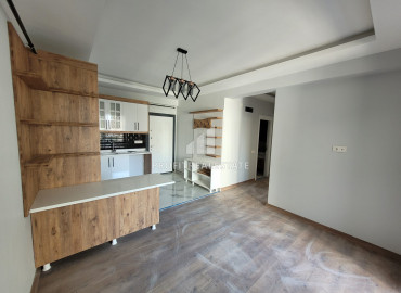 Стильная новая квартира c двумя спальнями, 110м², у моря в районе Мезитли, Мерсин, ID-10656 фото-2