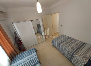 Просторная квартира с двумя спальнями, 120м², с отличной локацией в 450м от моря в Махмутларе ID-10679 фото-12