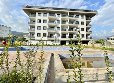 Two bedroom apartment with a separate kitchen, in a new residence in Oba, Alanya, 120 m2 ID-10698 фото-1