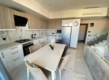 Luxury penthouse 1 + 1, 121m², in a residence at the final stage of construction in the center of Alanya ID-10756 фото-2