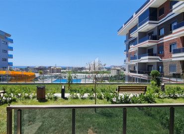 One-bedroom apartment in a new building with a sea view, with a fine finish, unfurnished in Kargicak, Alanya ID-10779 фото-1