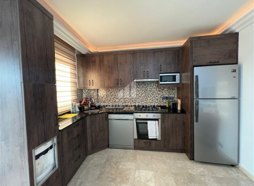 Уютная меблированная квартира с двумя спальнями, 120м², в районе Джикджилли, Алания ID-10837 фото-3