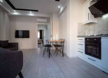 Двухкомнатные апартаменты, с мебелью, в новом газифицированном доме, Культур, Кепез, Анталья, 55 м2 ID-10841 фото-5