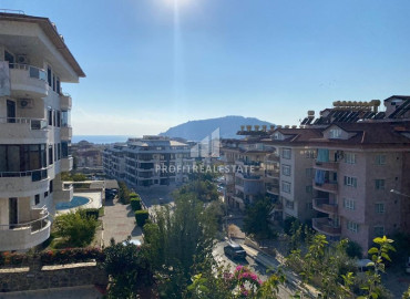 Bright two bedroom apartment with sea views, panoramic windows, in a residence with facilities in the center of Alanya ID-10847 фото-2