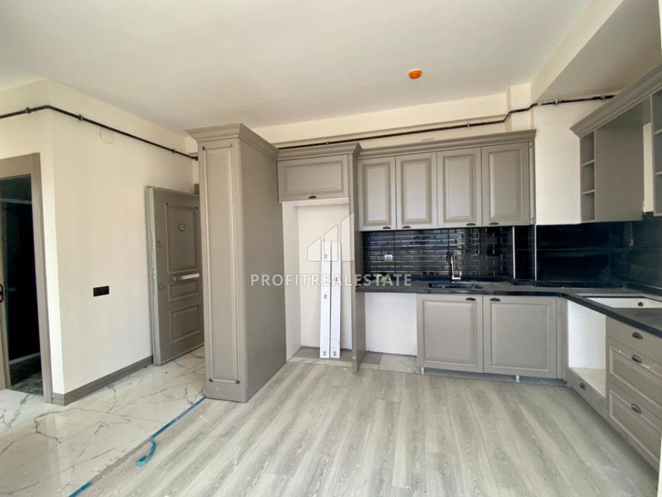 Трехкомнатная квартира, 115м², с чистовой отделкой, в газифицированном комплексе в районе Соли, Мерсин ID-10856 фото-2