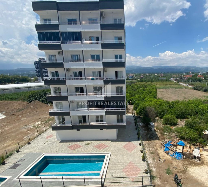 Готовая к проживанию, квартира 1+1, 45м², с видом на горы в районе Томюк, Мерсин ID-10857 фото-1