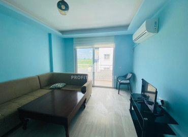 Готовая к проживанию, квартира 1+1, 45м², с видом на горы в районе Томюк, Мерсин ID-10857 фото-4